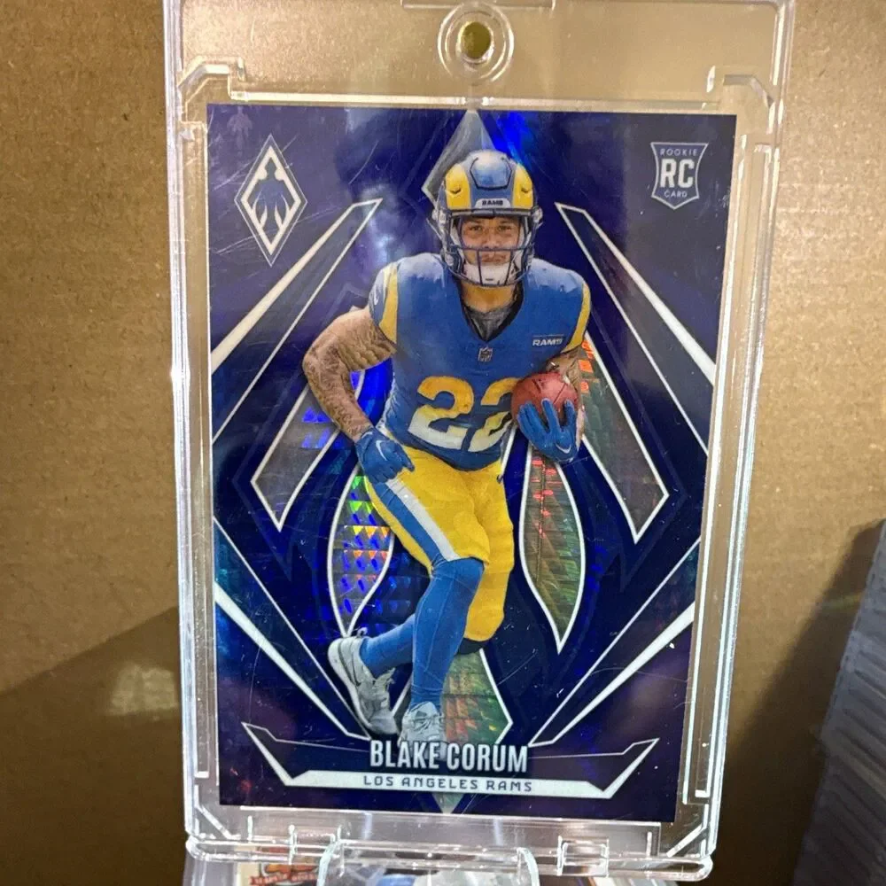 2024 Panini Phoenix Rookies Blake Corum RC Blue Hyper /70 #158 Rams